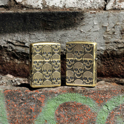 Zippo Lighter: Skulls Cackling Cranium Design Antique Brass | 46302